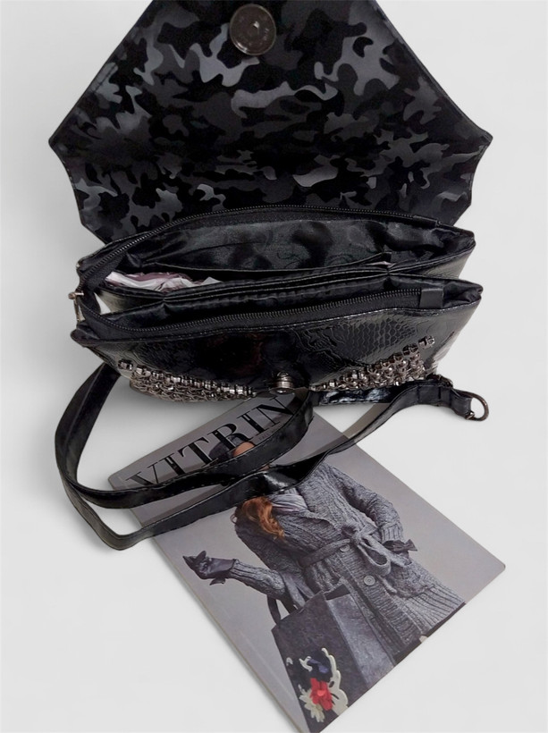 کیف زنانه چرم پرچی مشکی